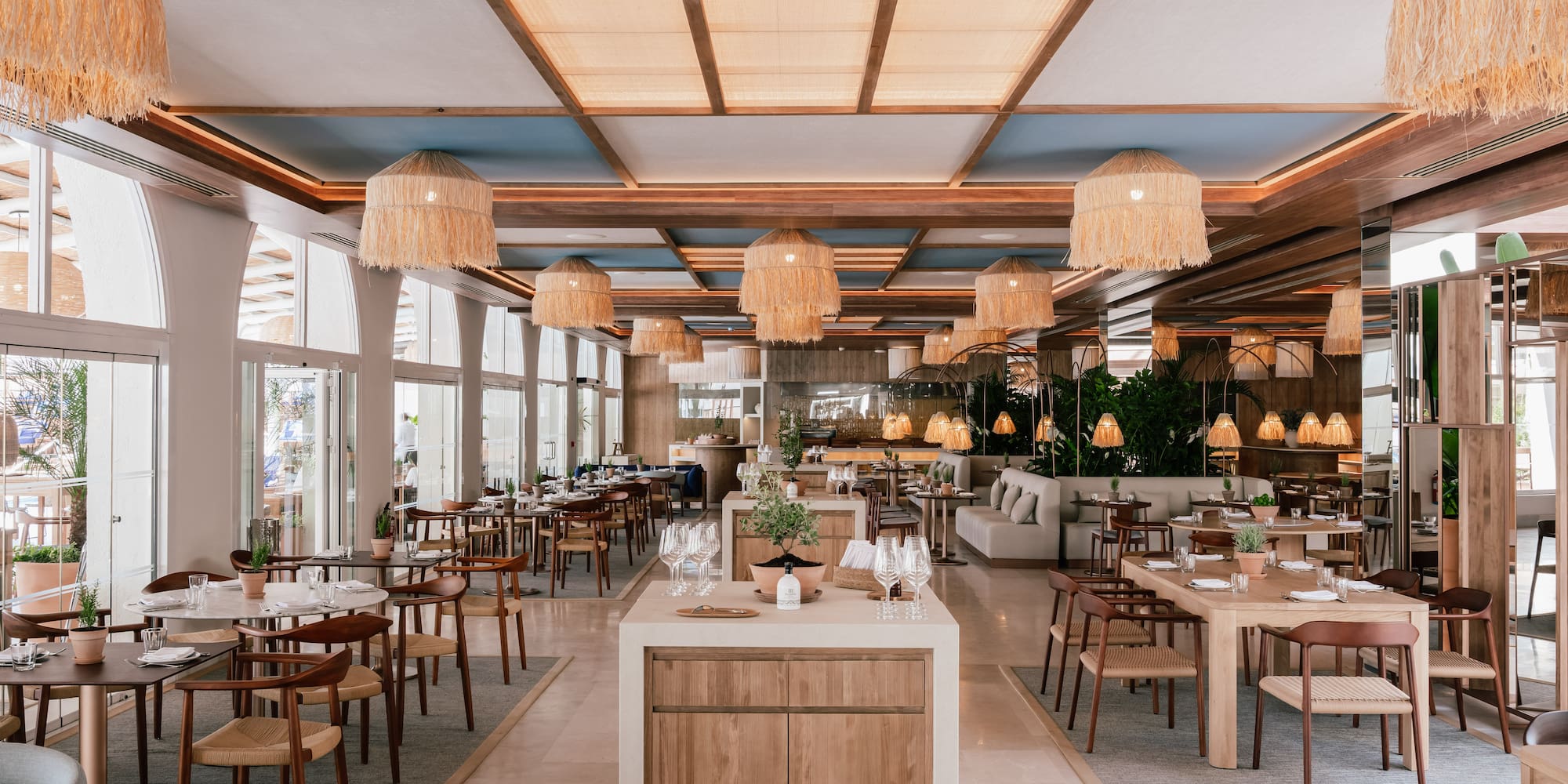 a restaurant with tables and chairs