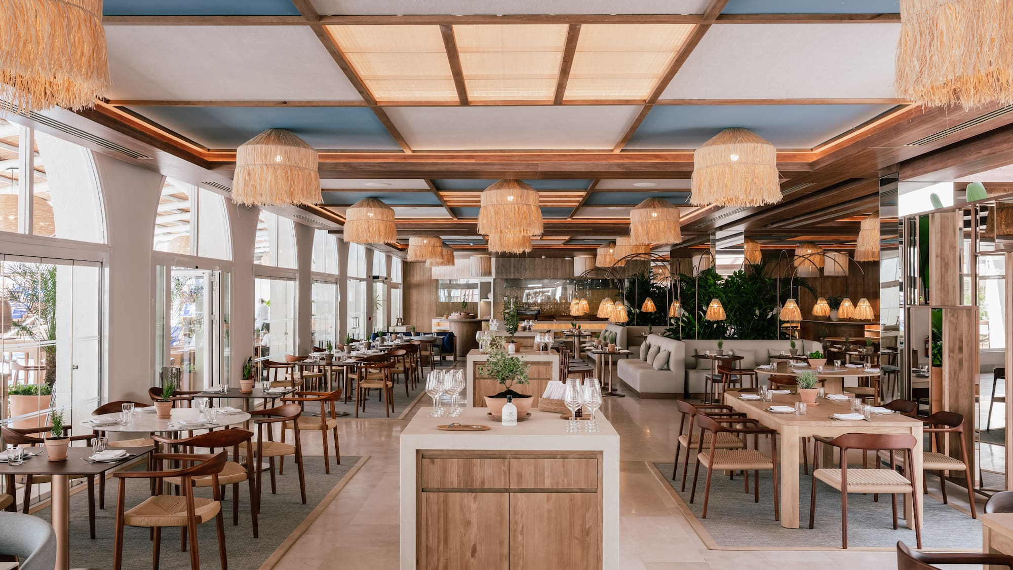 a restaurant with tables and chairs