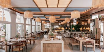 a restaurant with tables and chairs