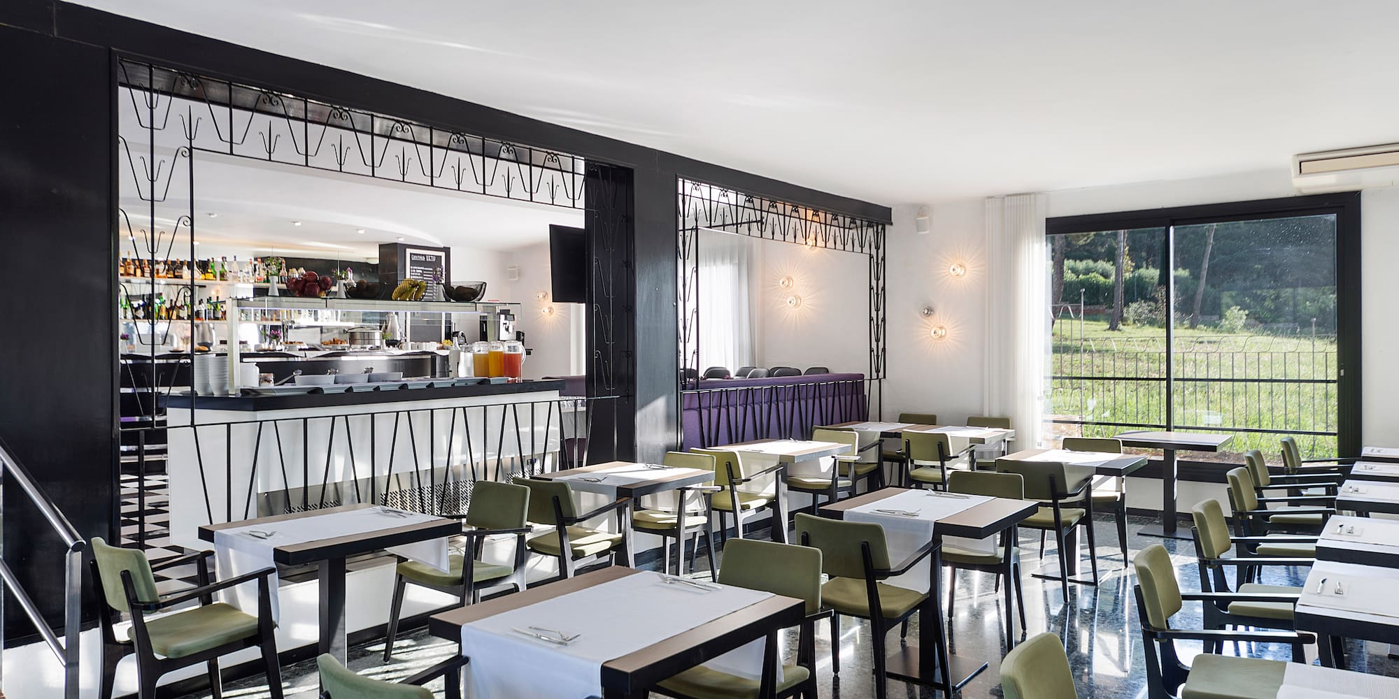 a room with tables and chairs