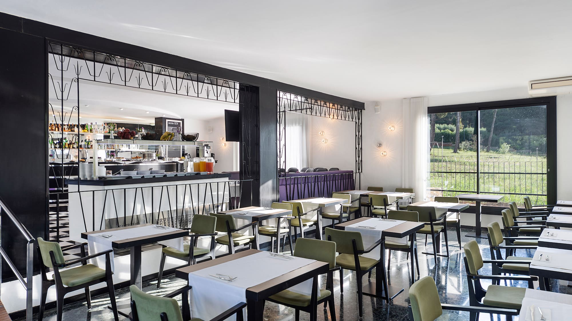 a room with tables and chairs