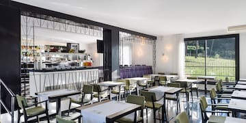 a room with tables and chairs