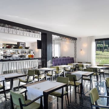 a room with tables and chairs