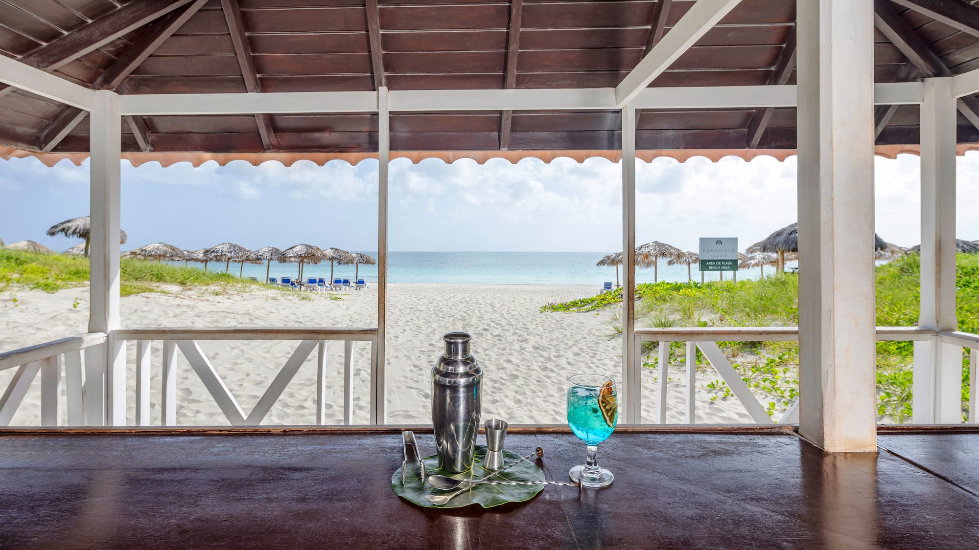 a bar with a drink on the table