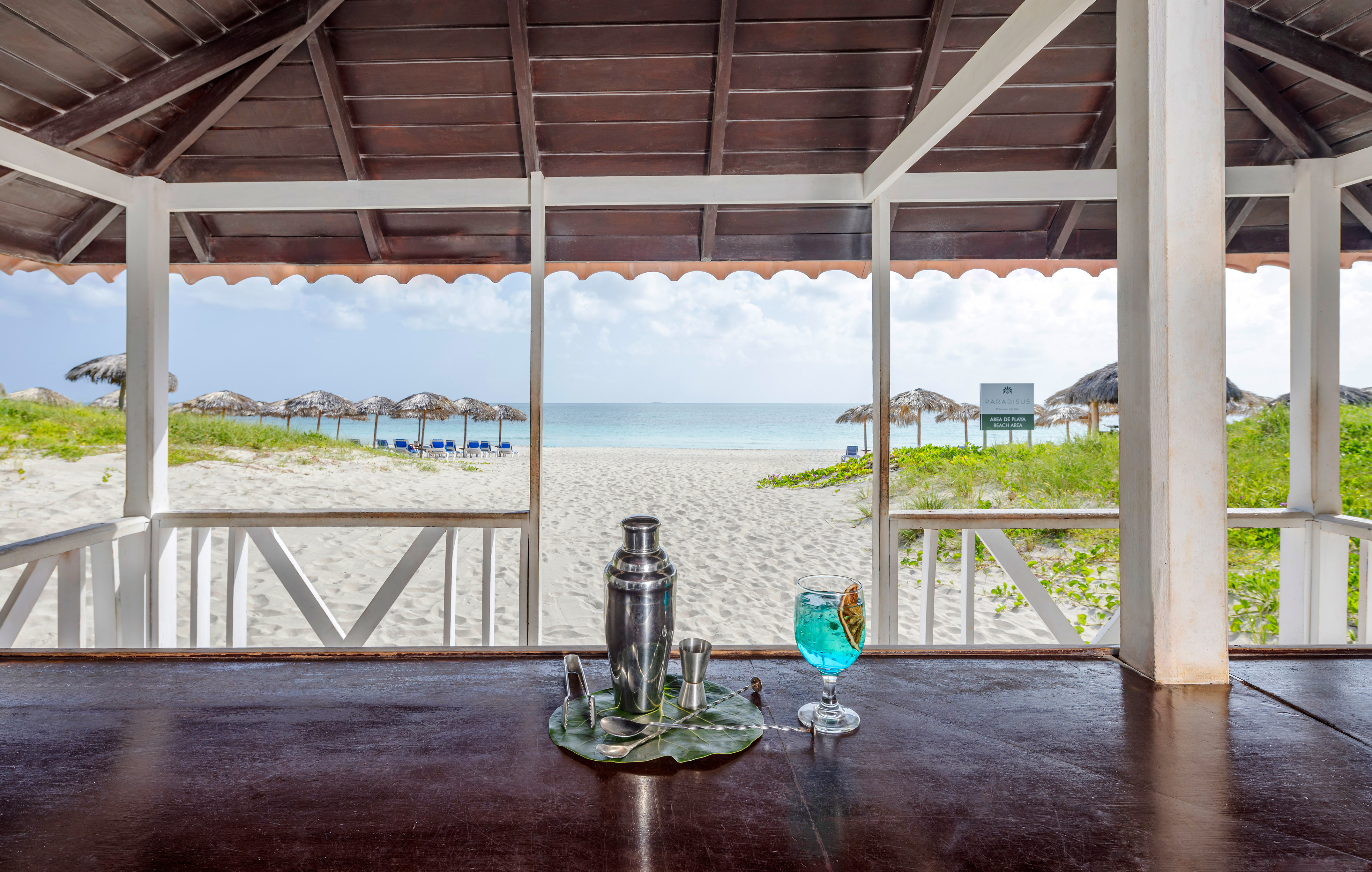 a bar with a drink on the table