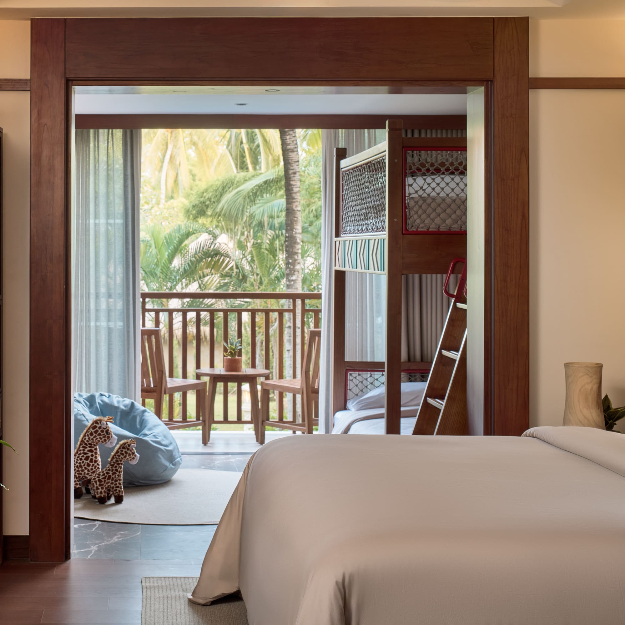 a bedroom with a bed and a bunk bed