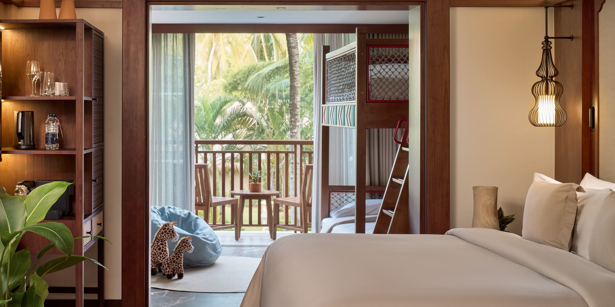 a bedroom with a bed and a bunk bed