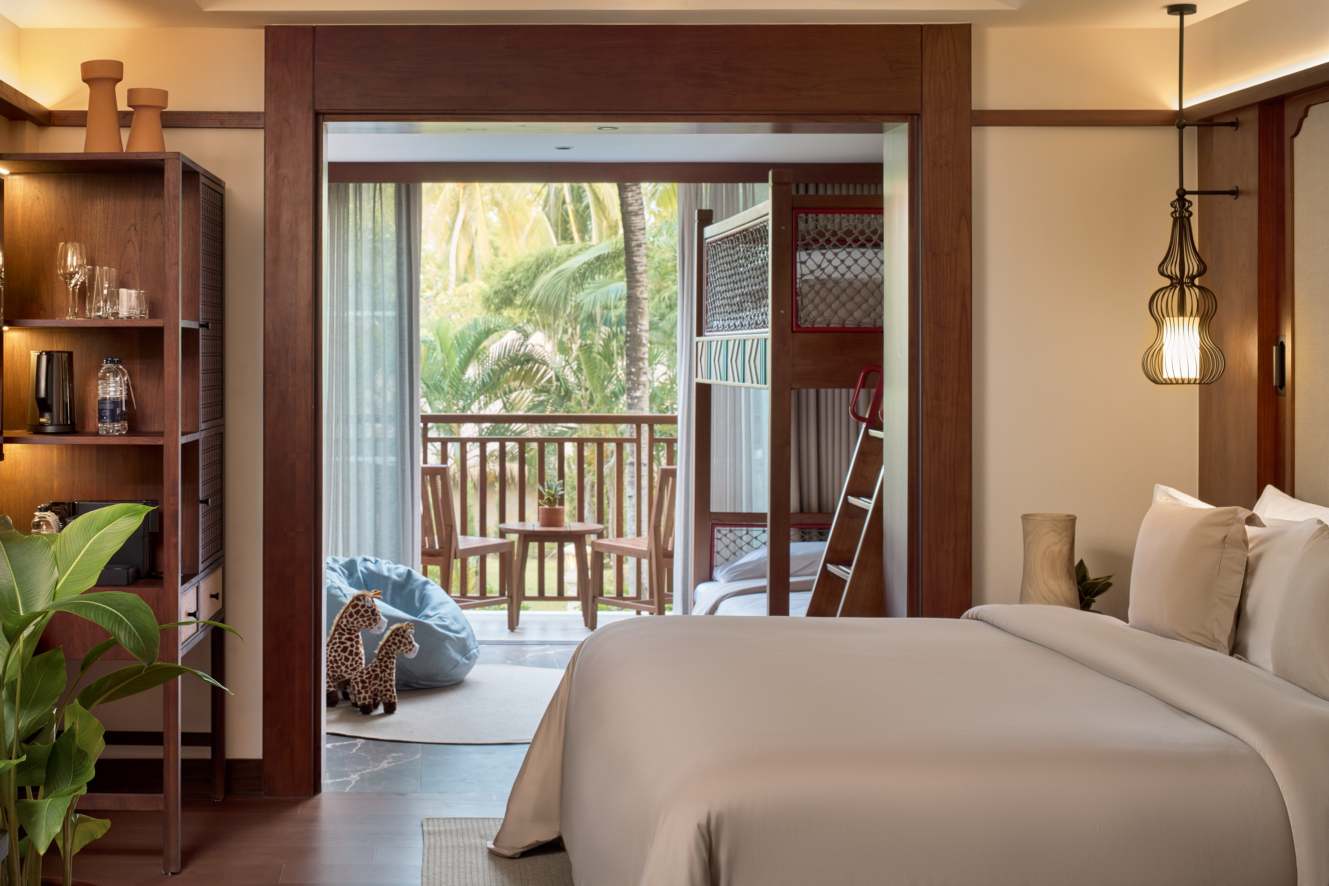 a bedroom with a bed and a bunk bed