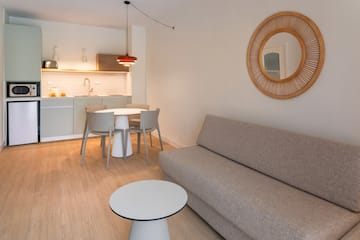 a living room with a couch and table