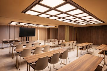 a room with tables and chairs