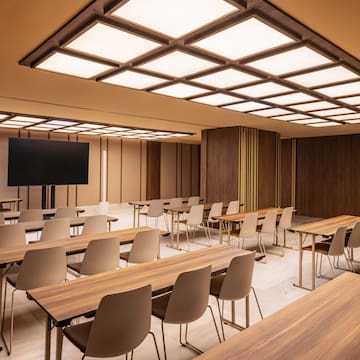 a room with tables and chairs