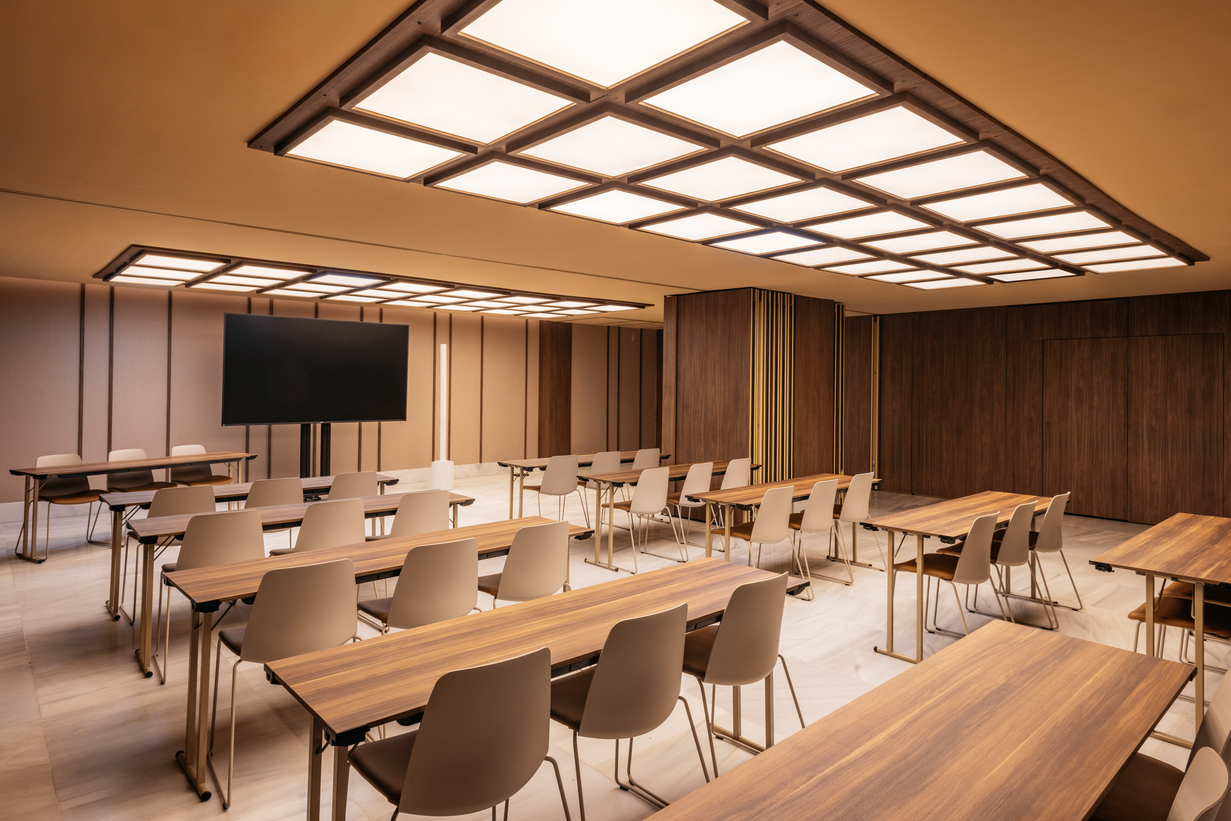 a room with tables and chairs