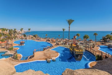 a water park with a boat and a ship