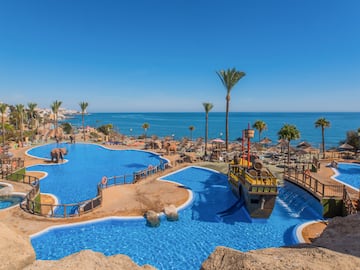 a water park with a boat and a ship