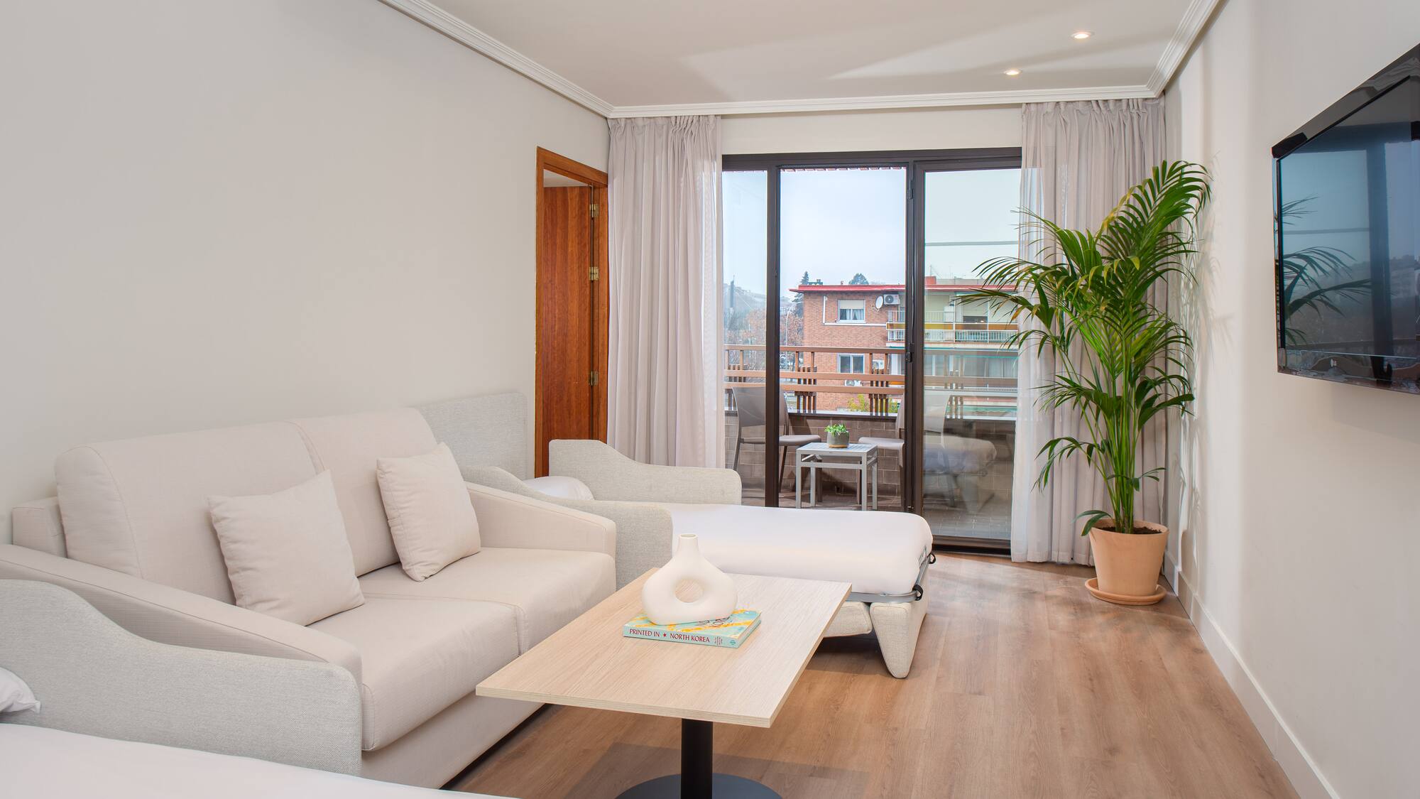 a living room with couches and a table