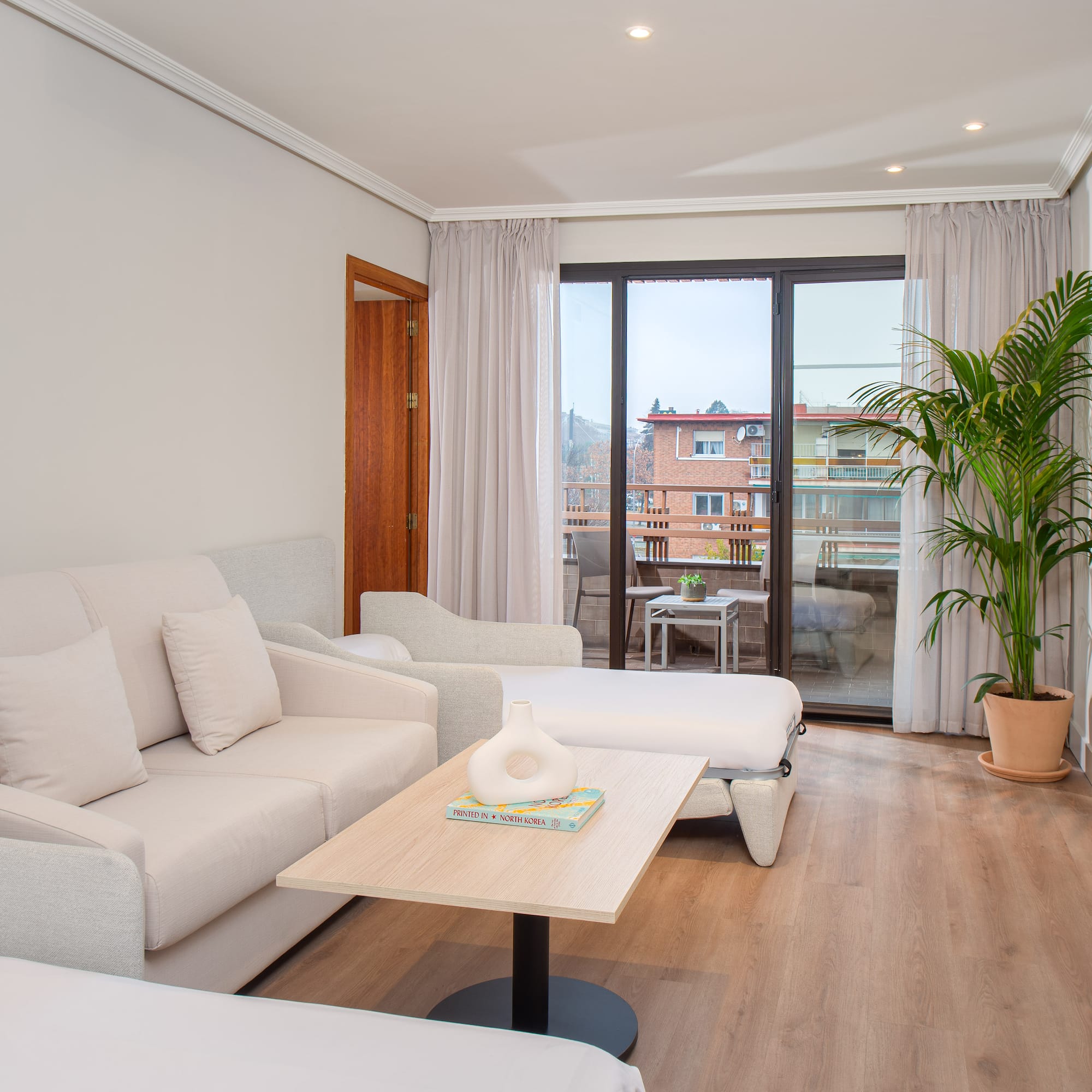 a living room with couches and a table