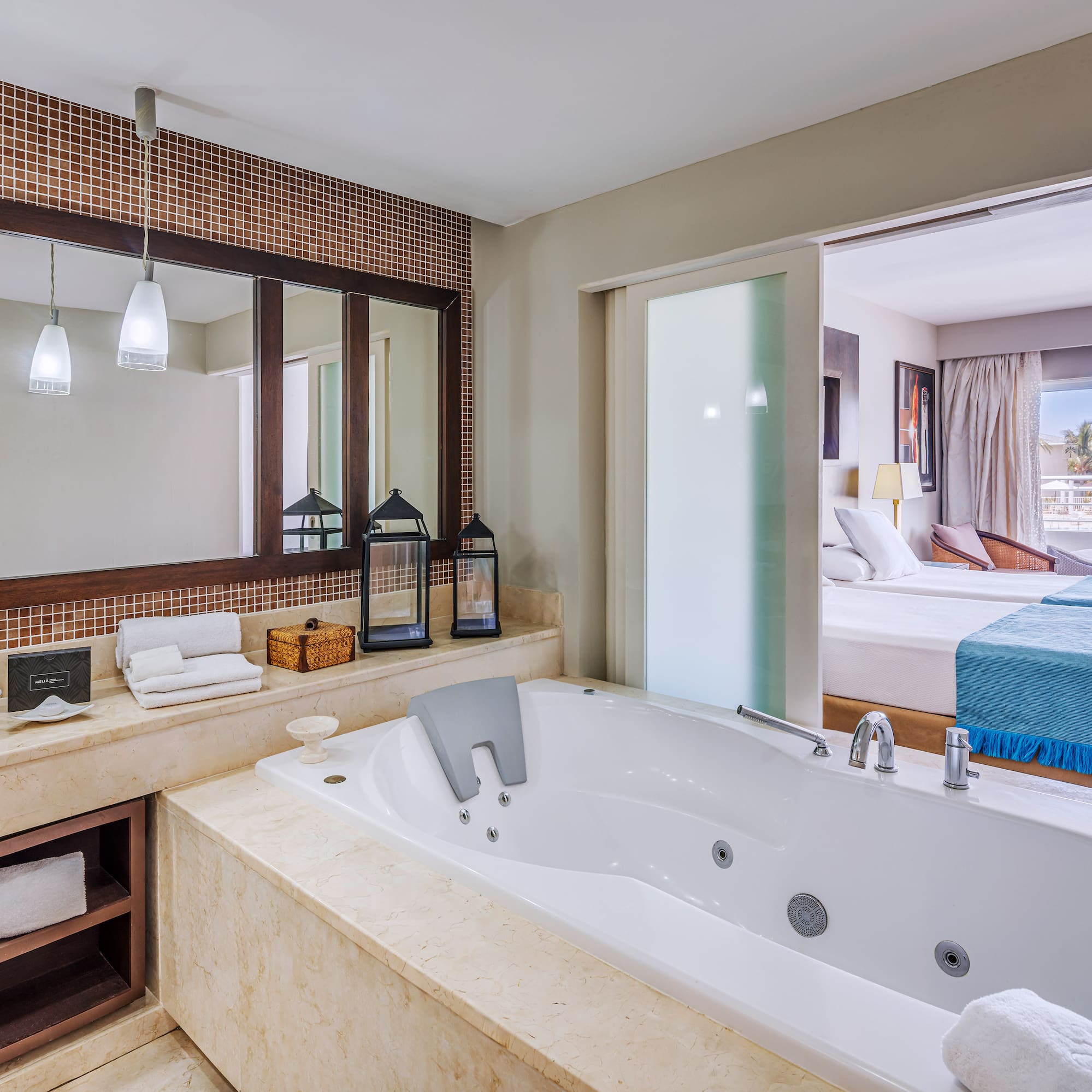 a bathroom with a bathtub and a mirror