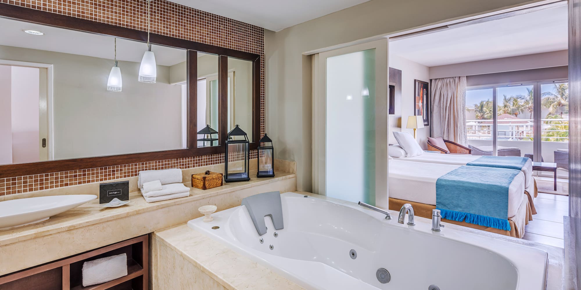 a bathroom with a bathtub and a mirror