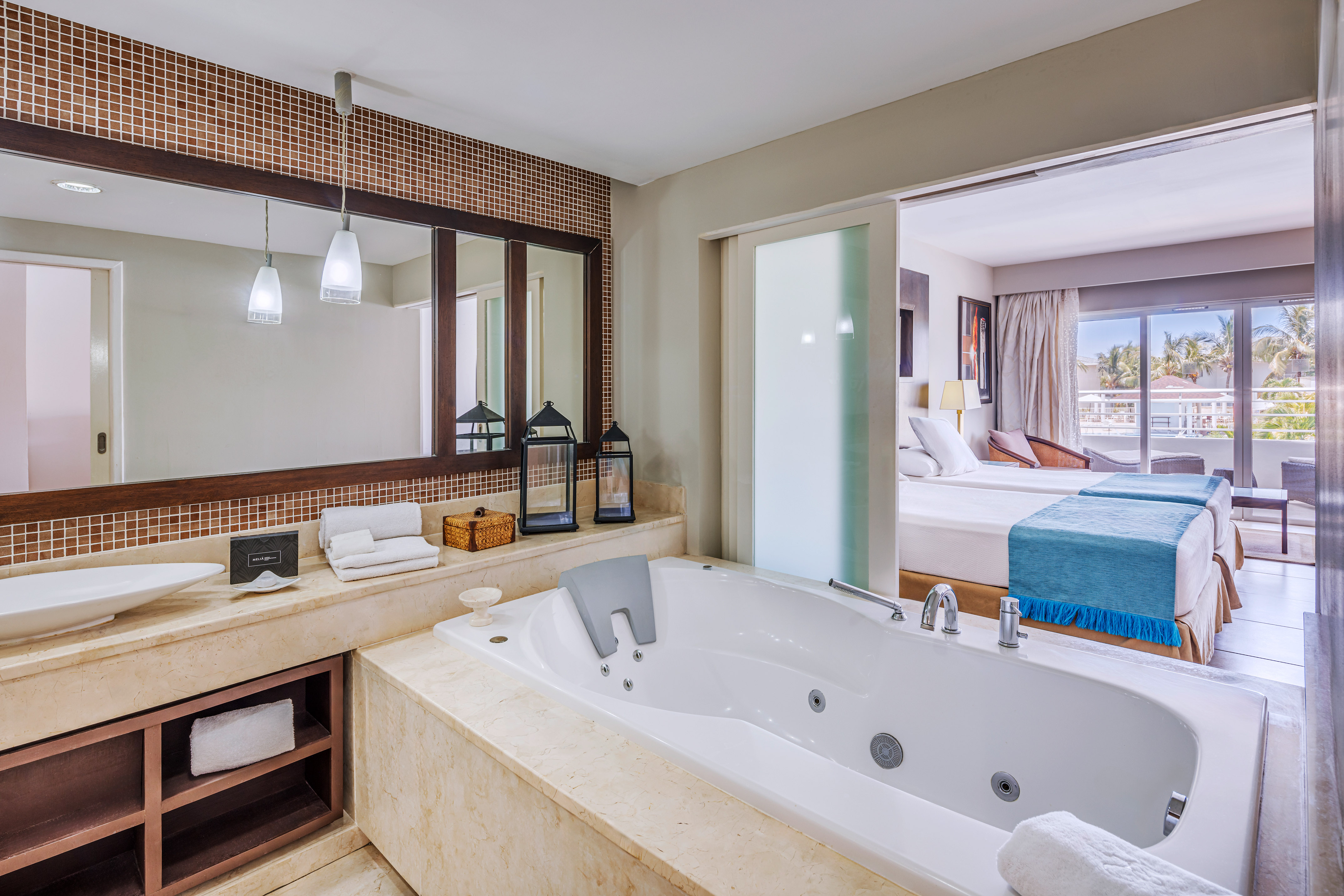 a bathroom with a bathtub and a mirror