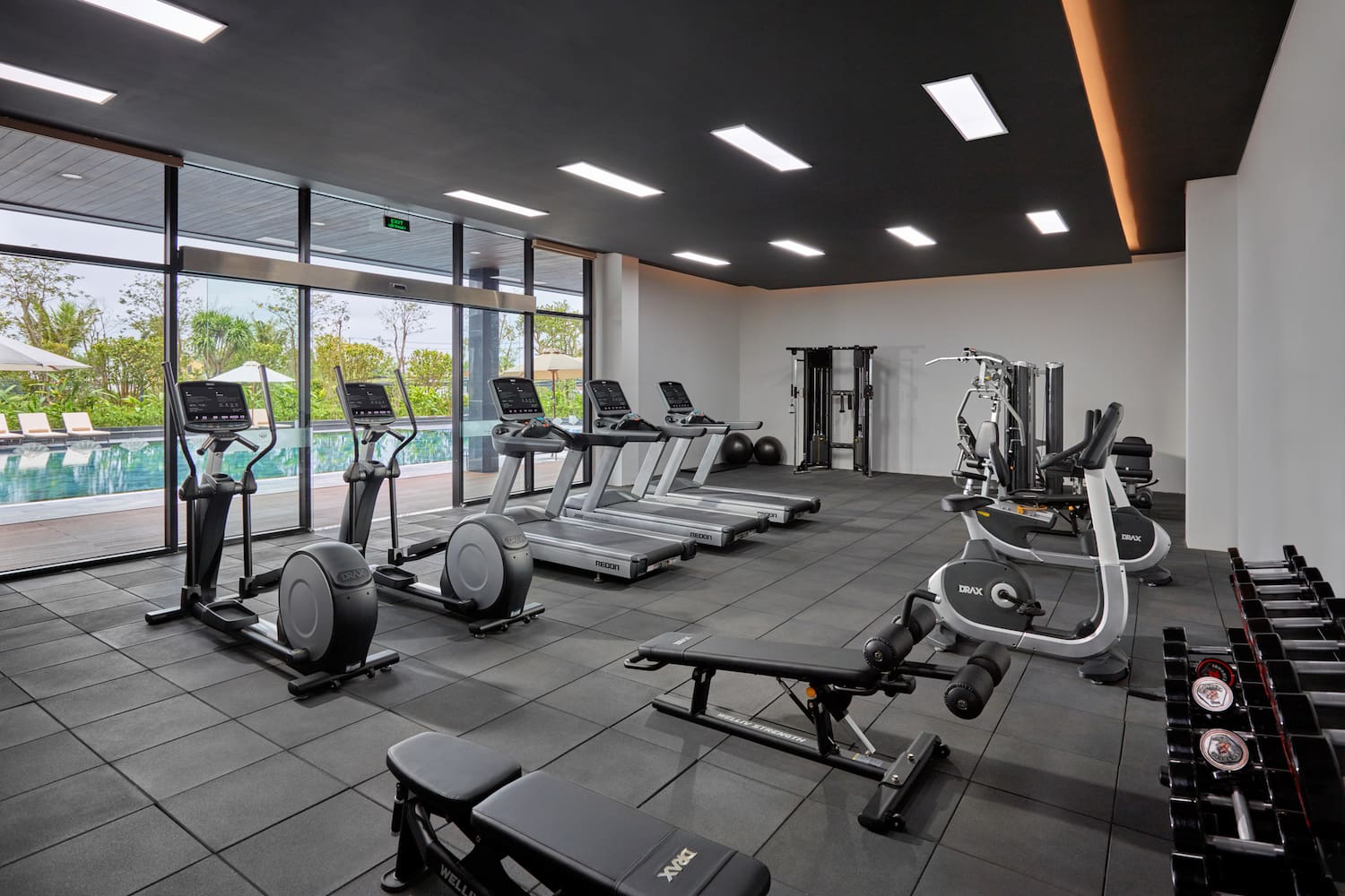 a large room with exercise equipment