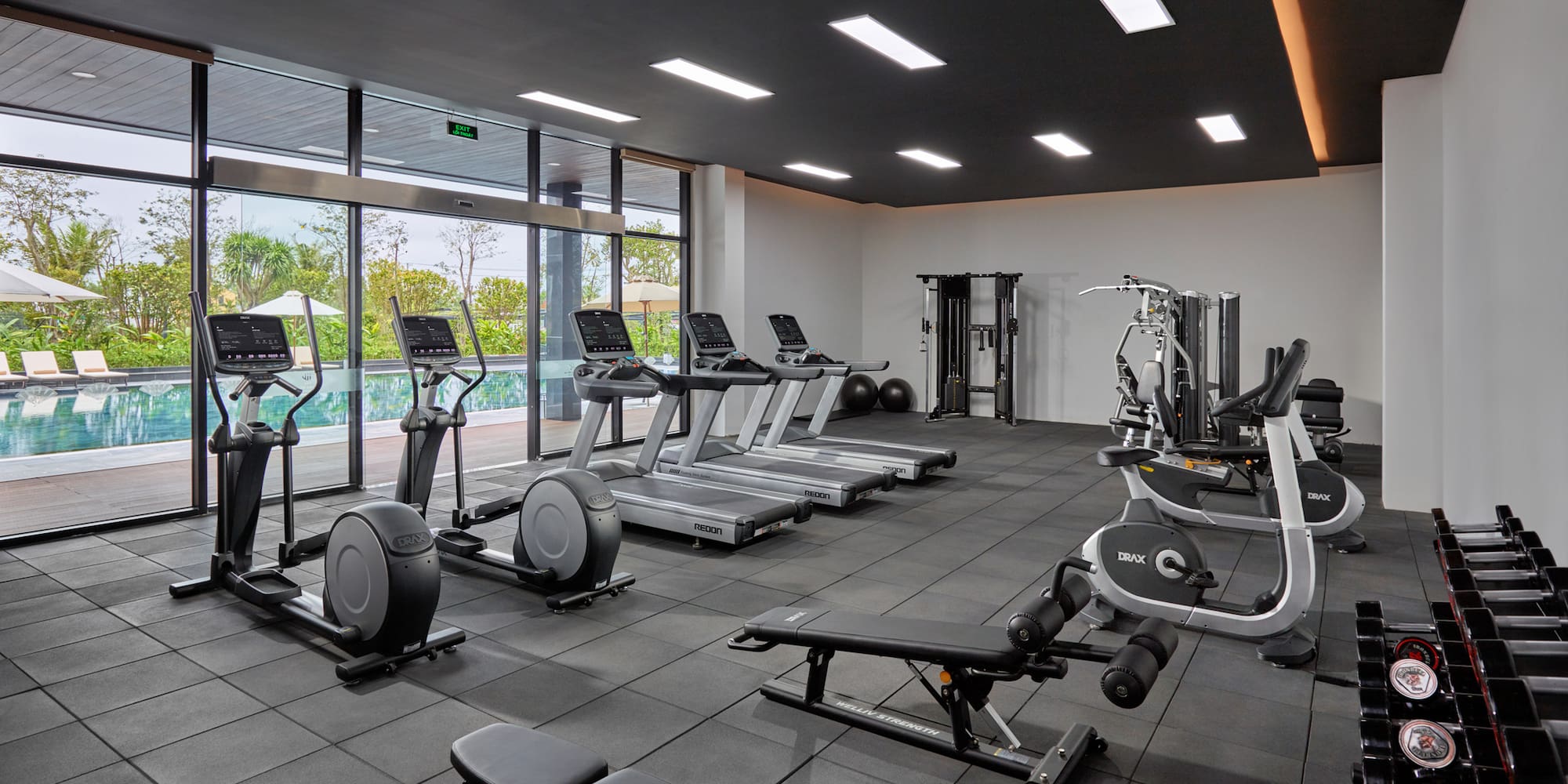a large room with exercise equipment