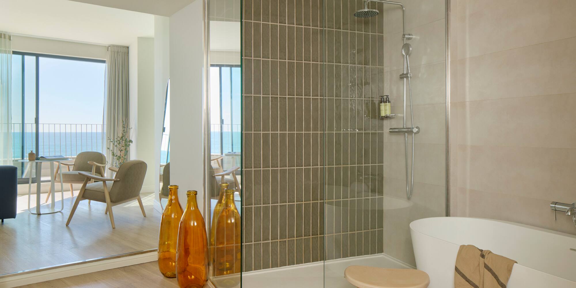 a bathroom with a tub and a shower