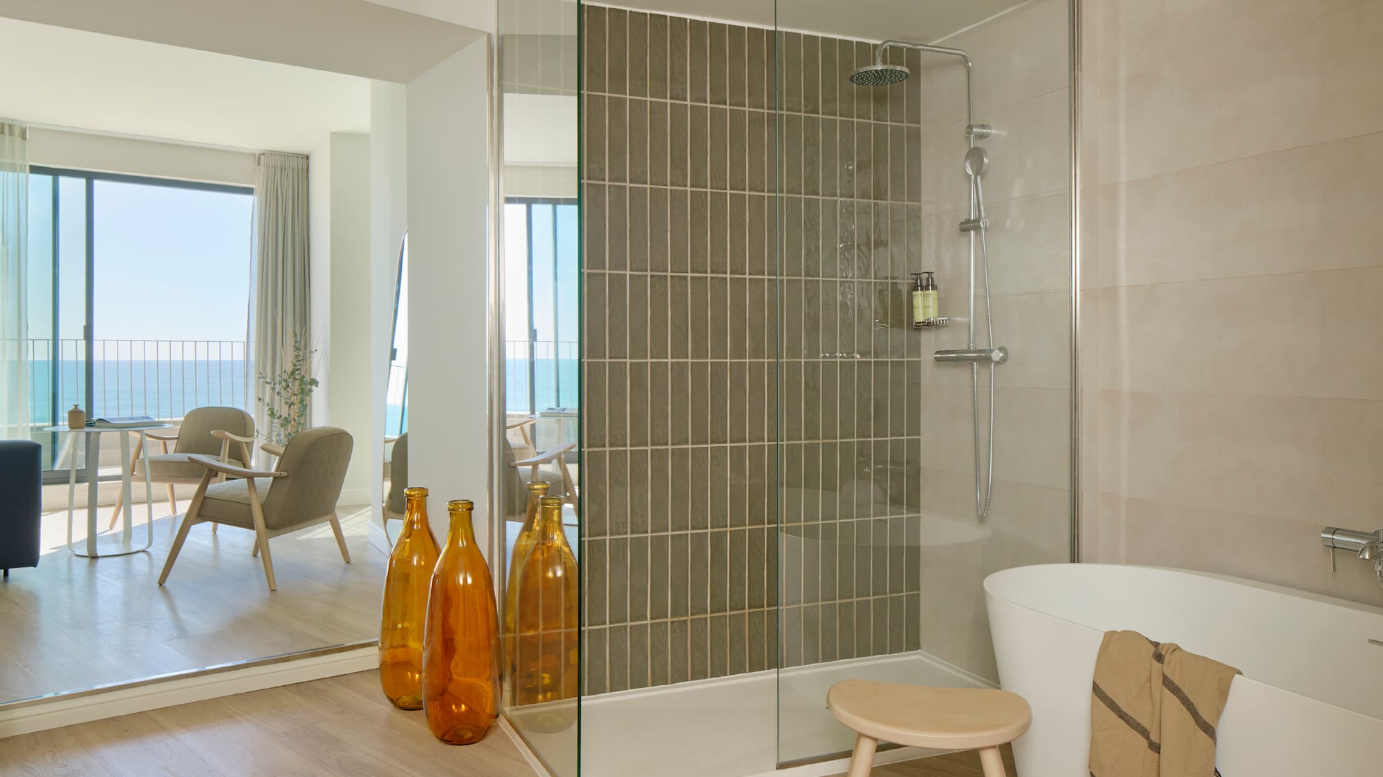 a bathroom with a tub and a shower