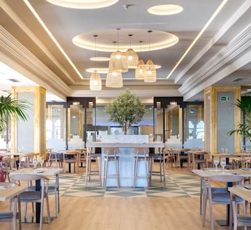 a room with tables and chairs