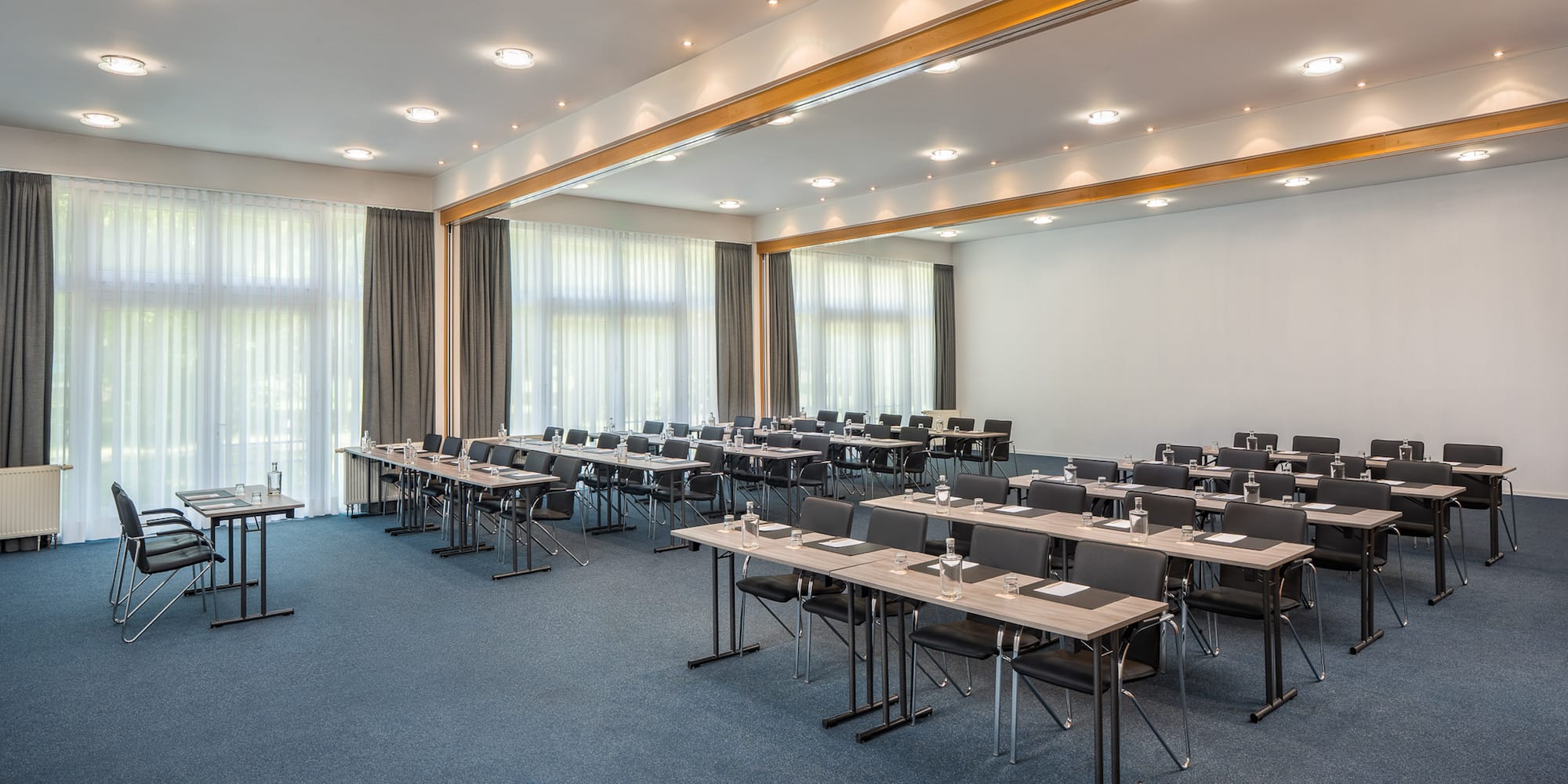 a room with tables and chairs