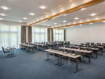 a room with tables and chairs