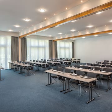 a room with tables and chairs