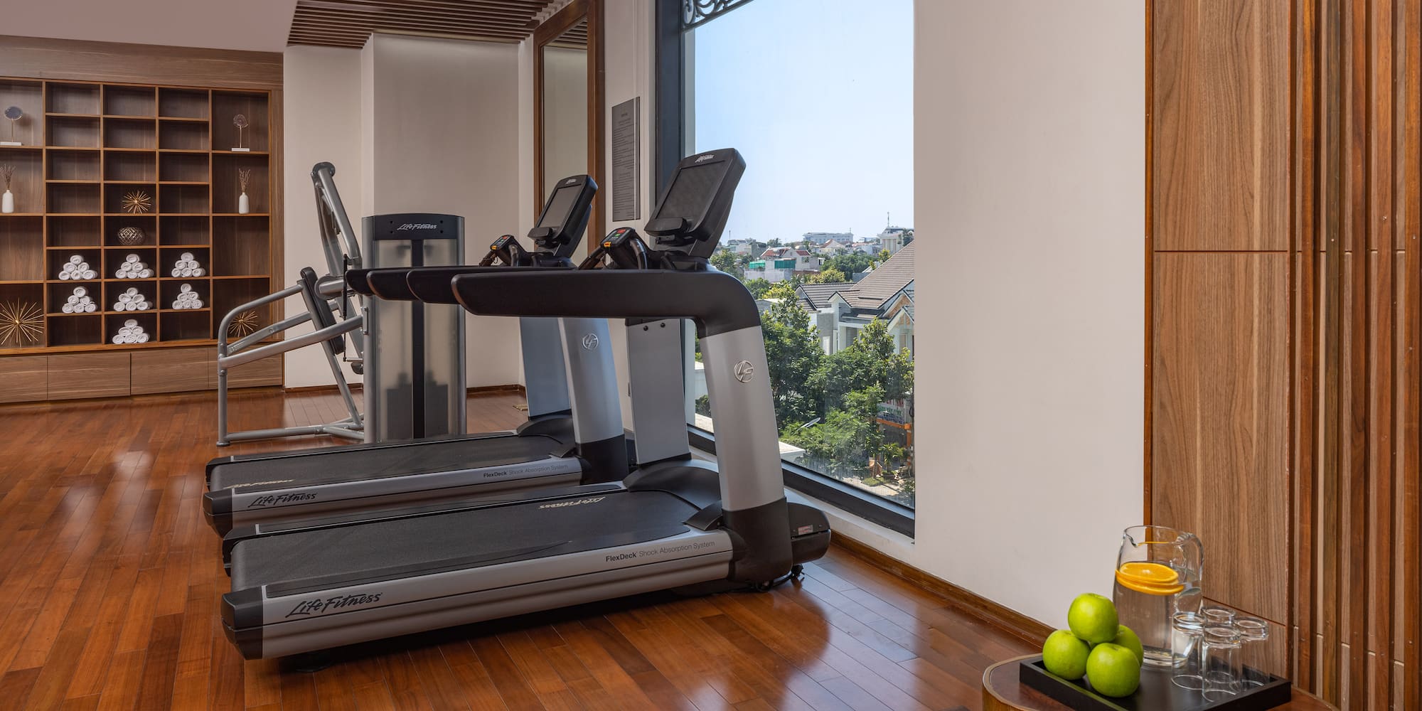 a room with treadmills and a window