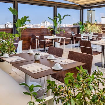 a restaurant with tables and chairs