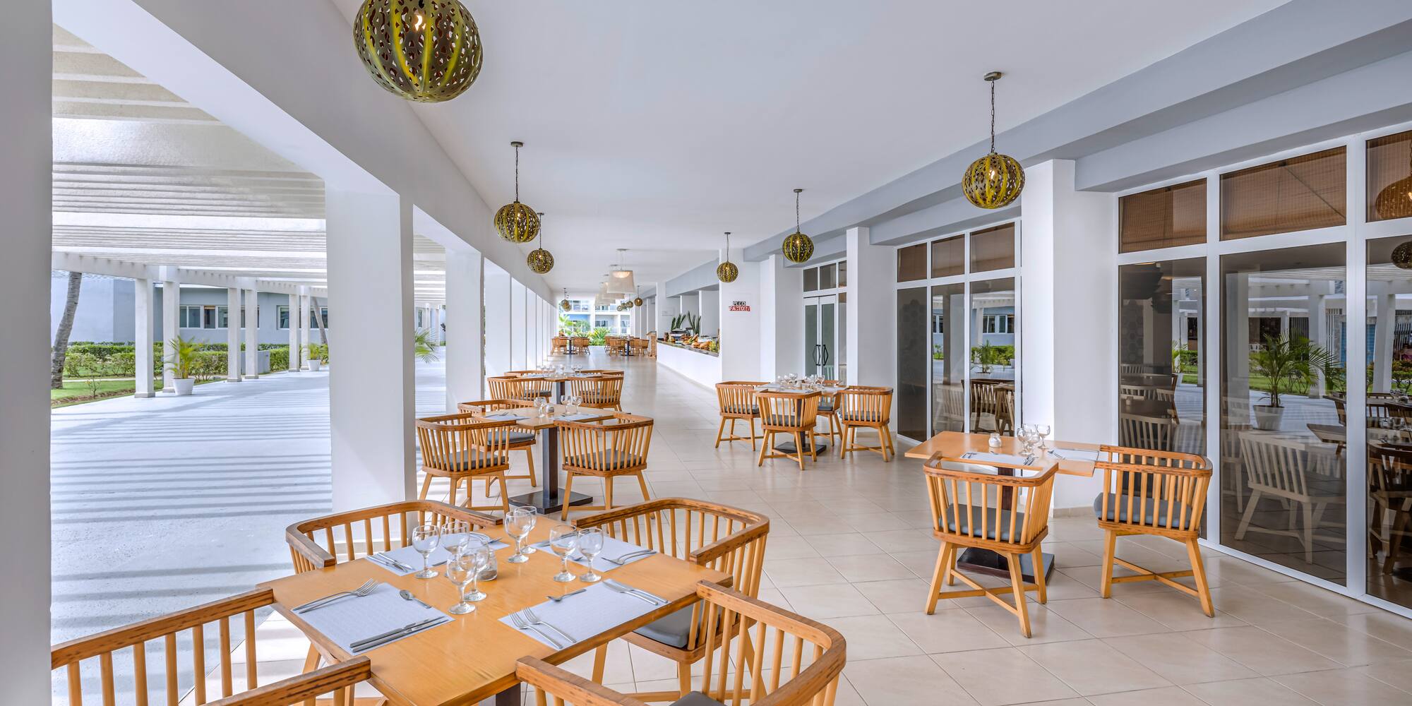 a restaurant with tables and chairs