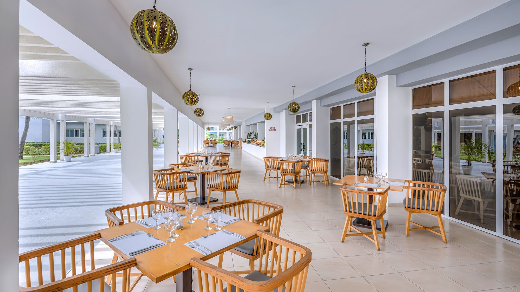 a restaurant with tables and chairs