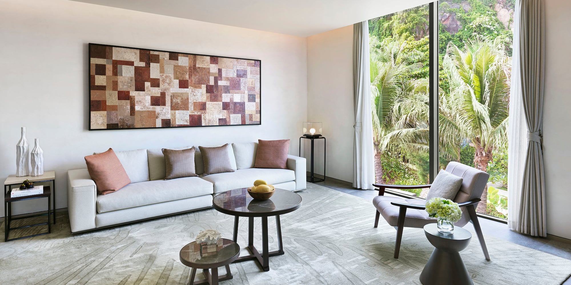 a living room with a couch and chairs