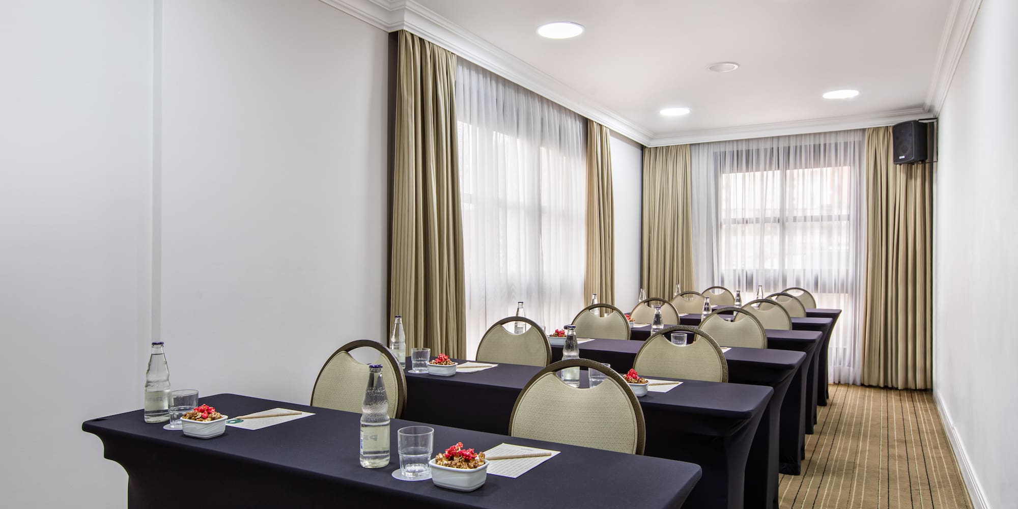 a room with tables and chairs