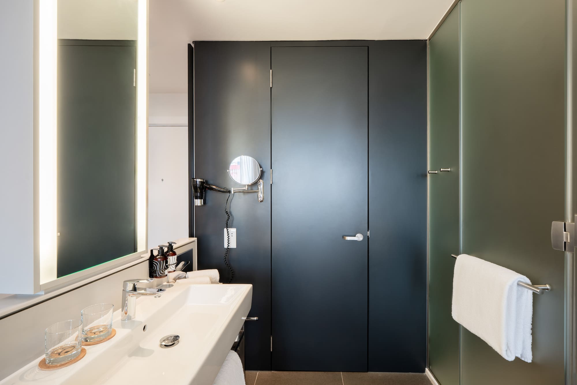 a bathroom with a sink and mirror
