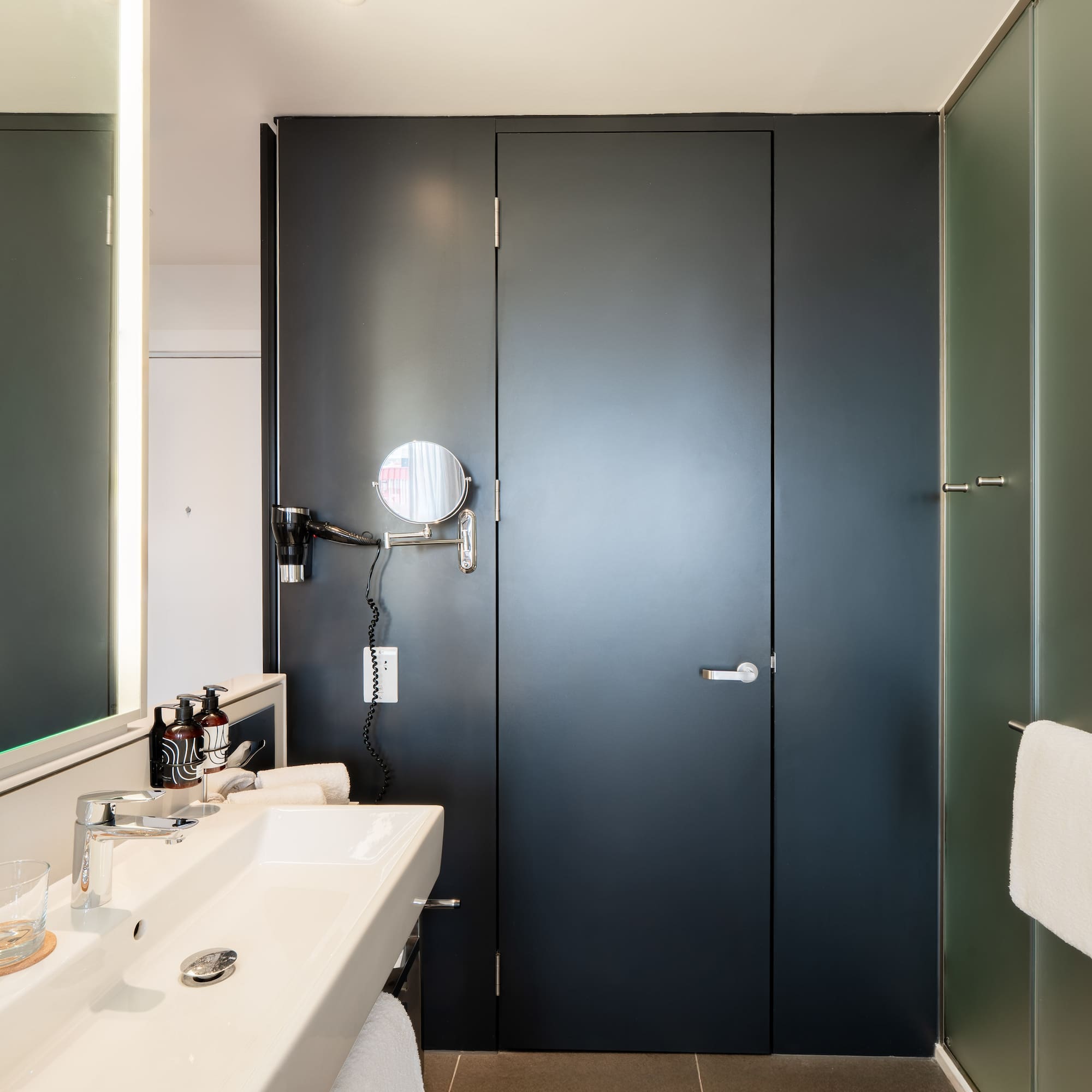 a bathroom with a sink and mirror