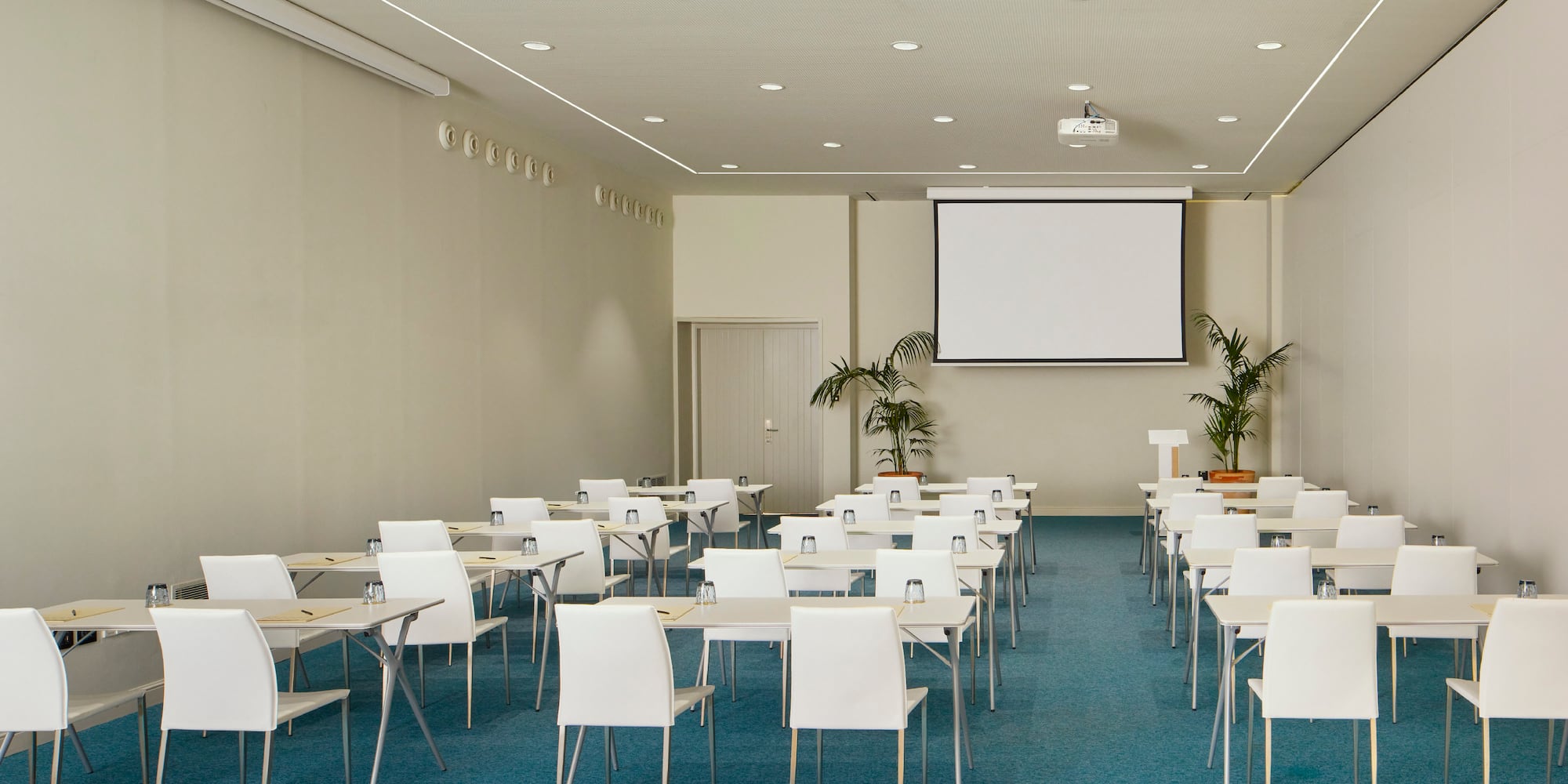 a room with tables and chairs