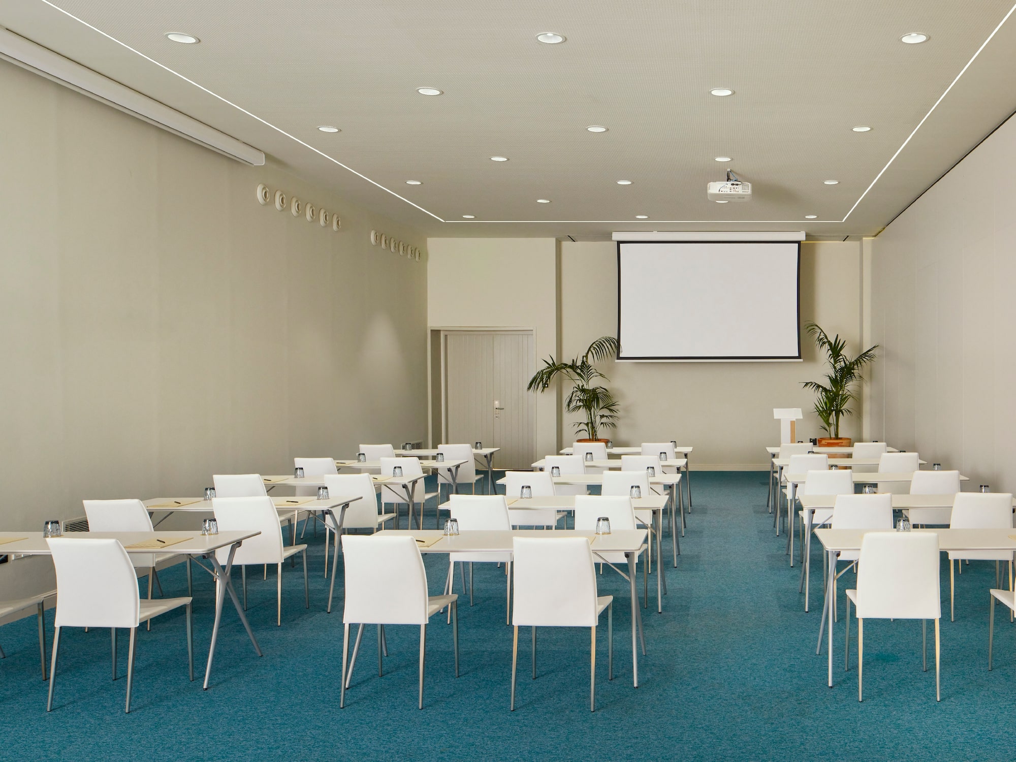 a room with tables and chairs