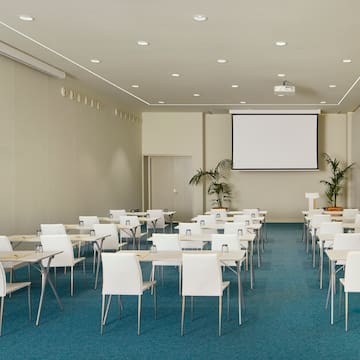 a room with tables and chairs