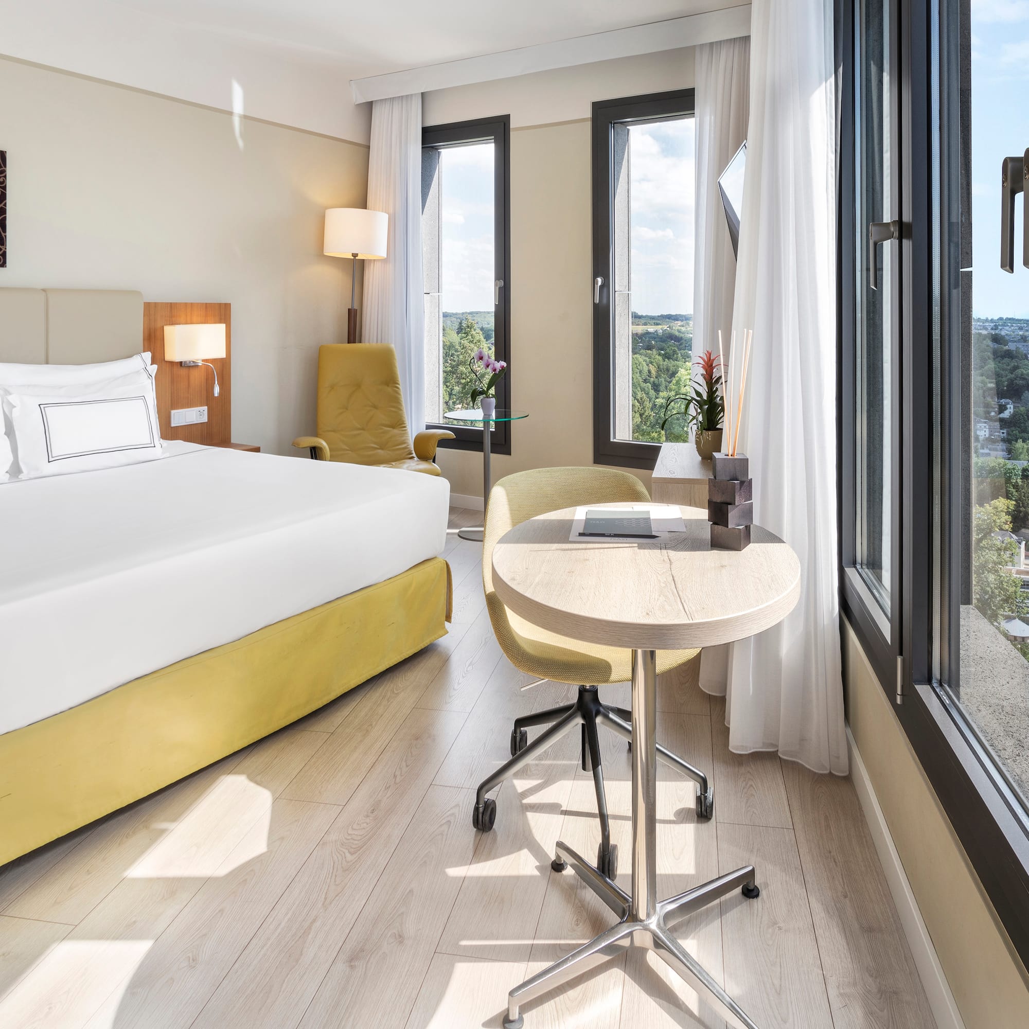 a room with a bed and a table