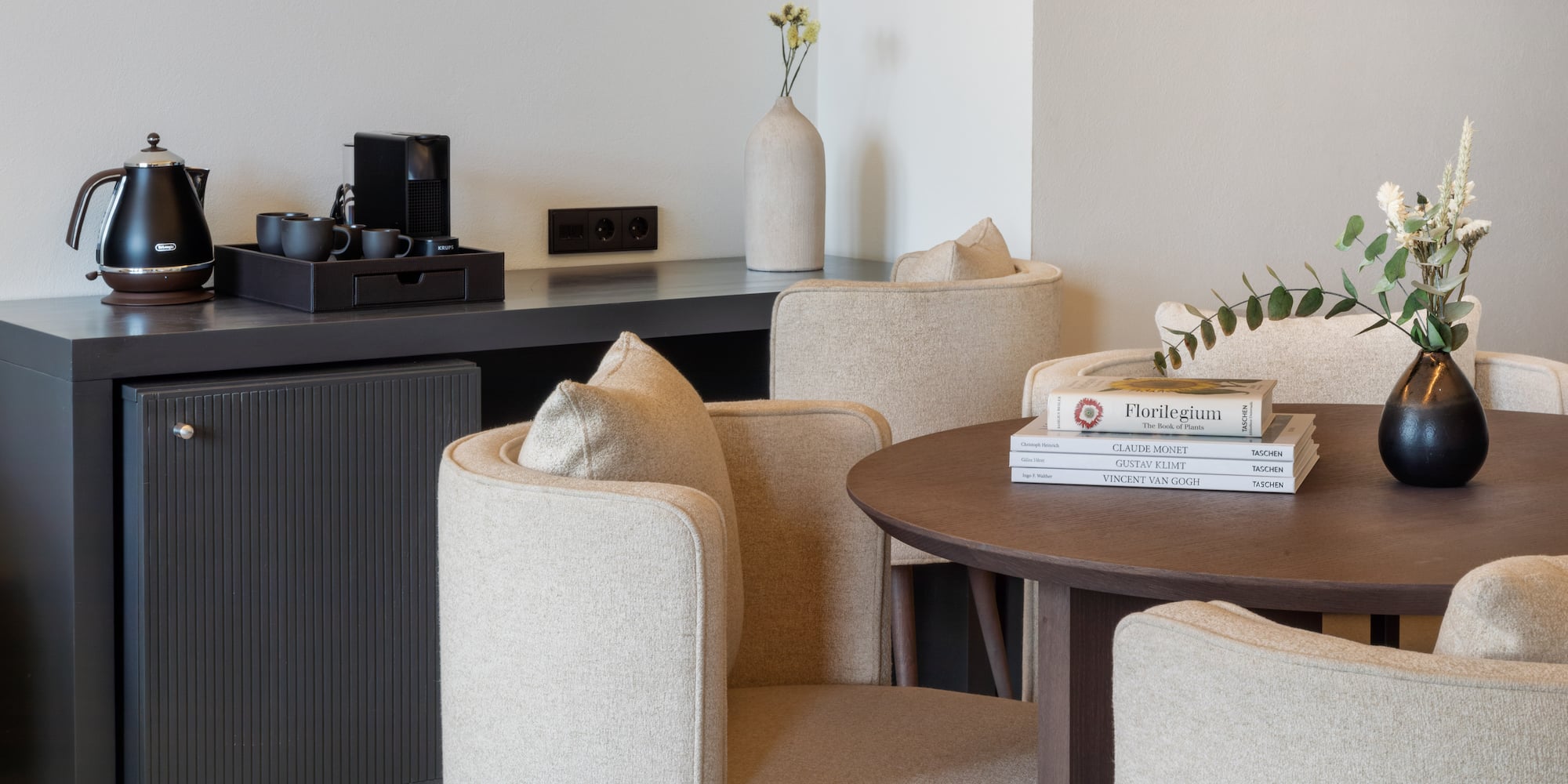 a room with a table and chairs