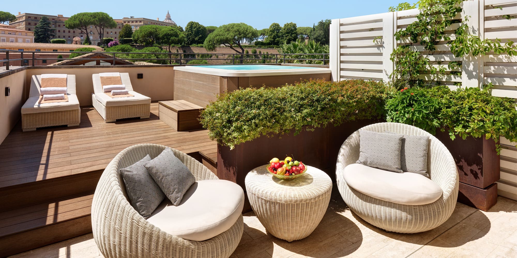 a patio with chairs and a pool