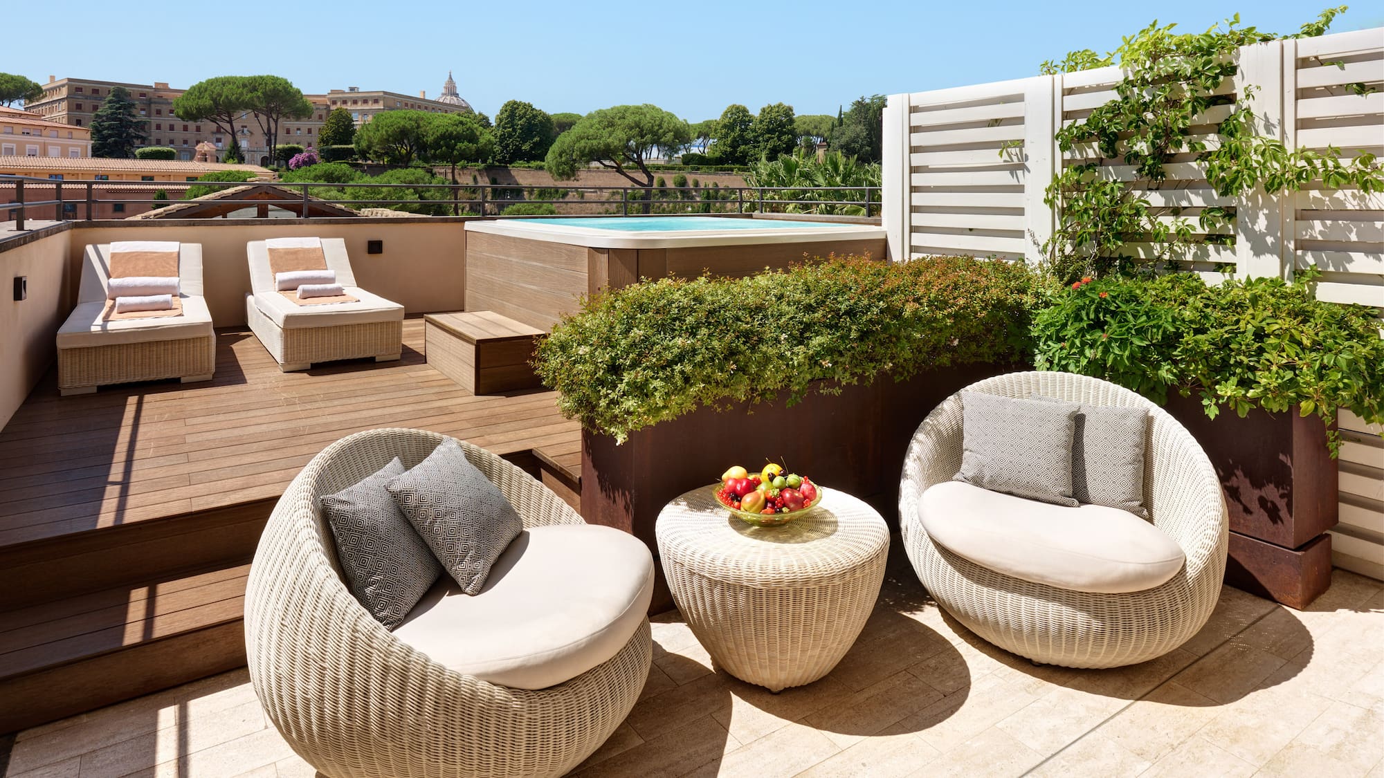 a patio with chairs and a pool