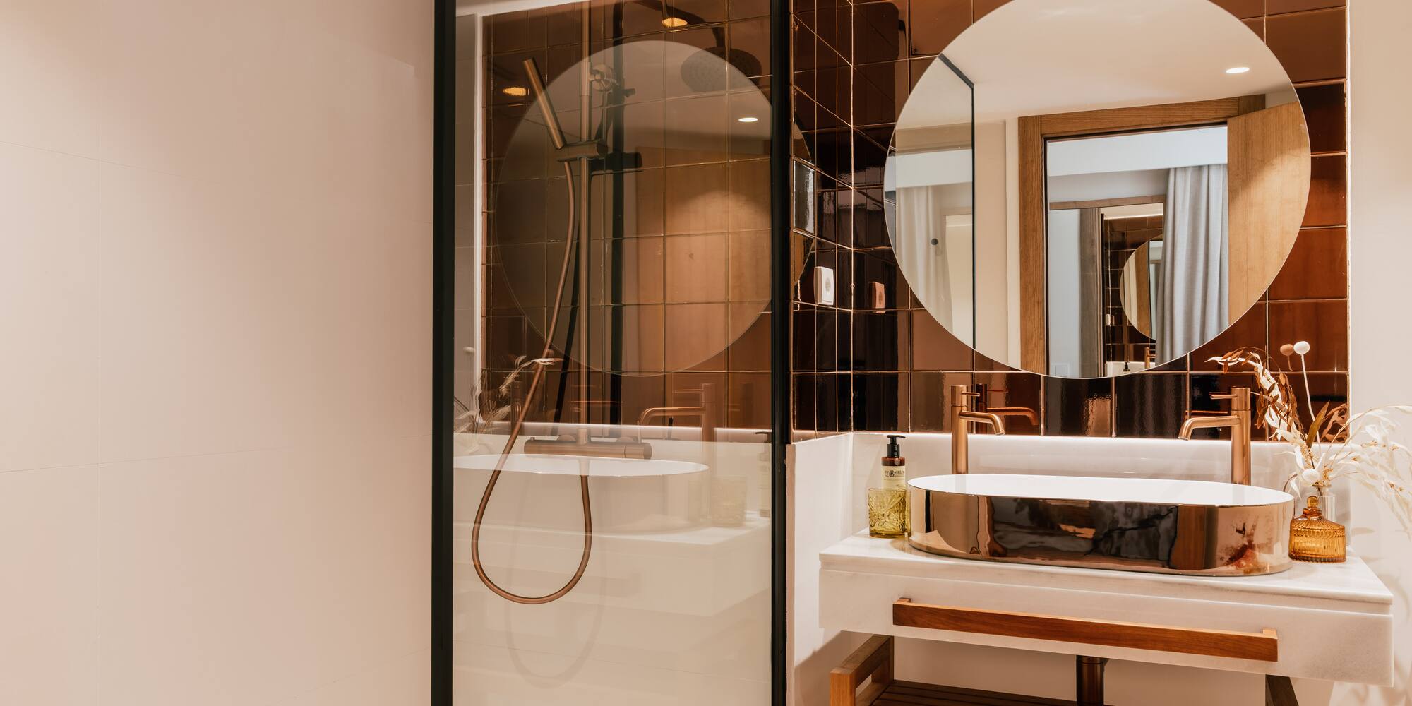 a bathroom with a shower and sink