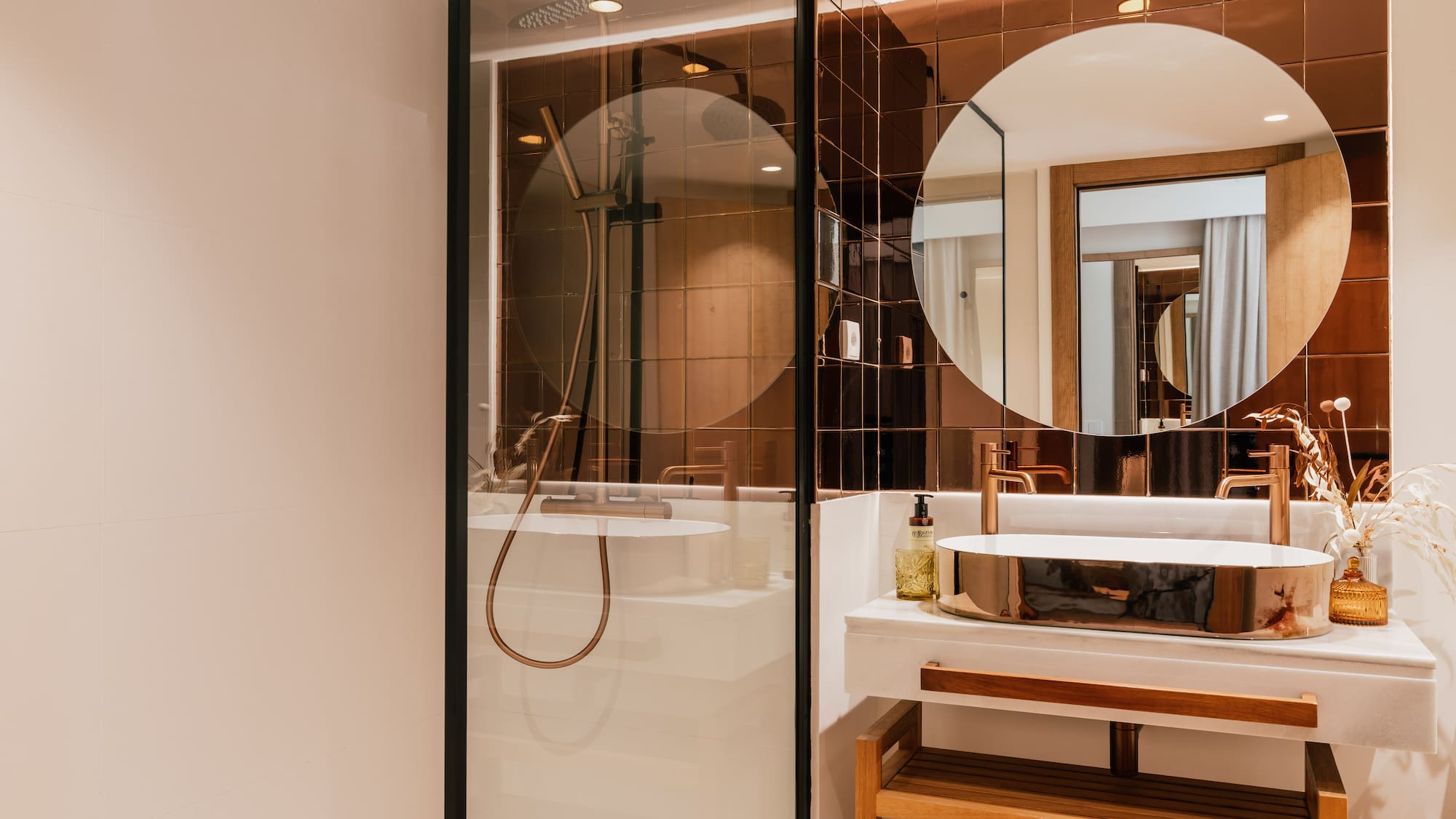 a bathroom with a shower and sink