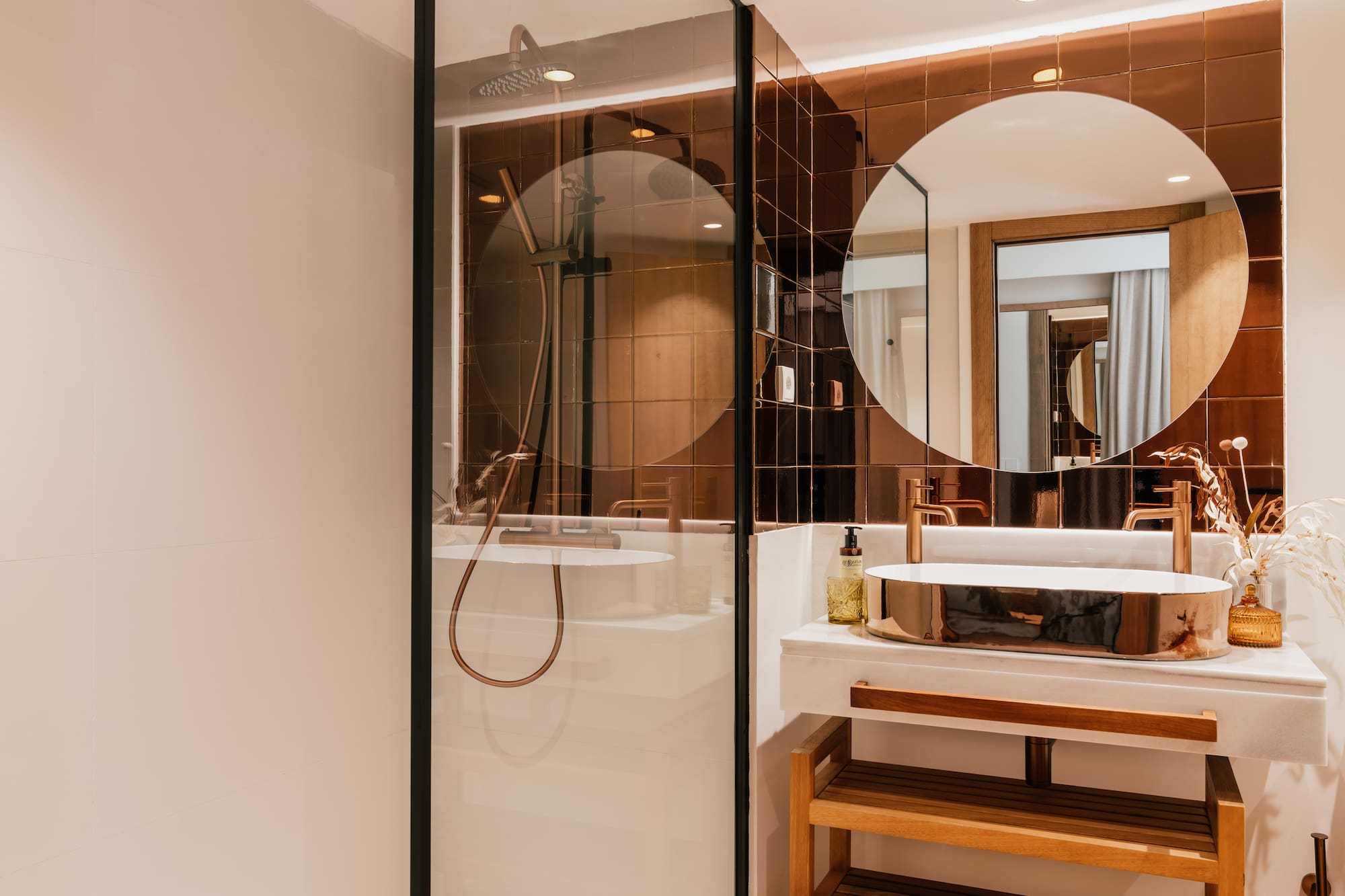 a bathroom with a shower and sink