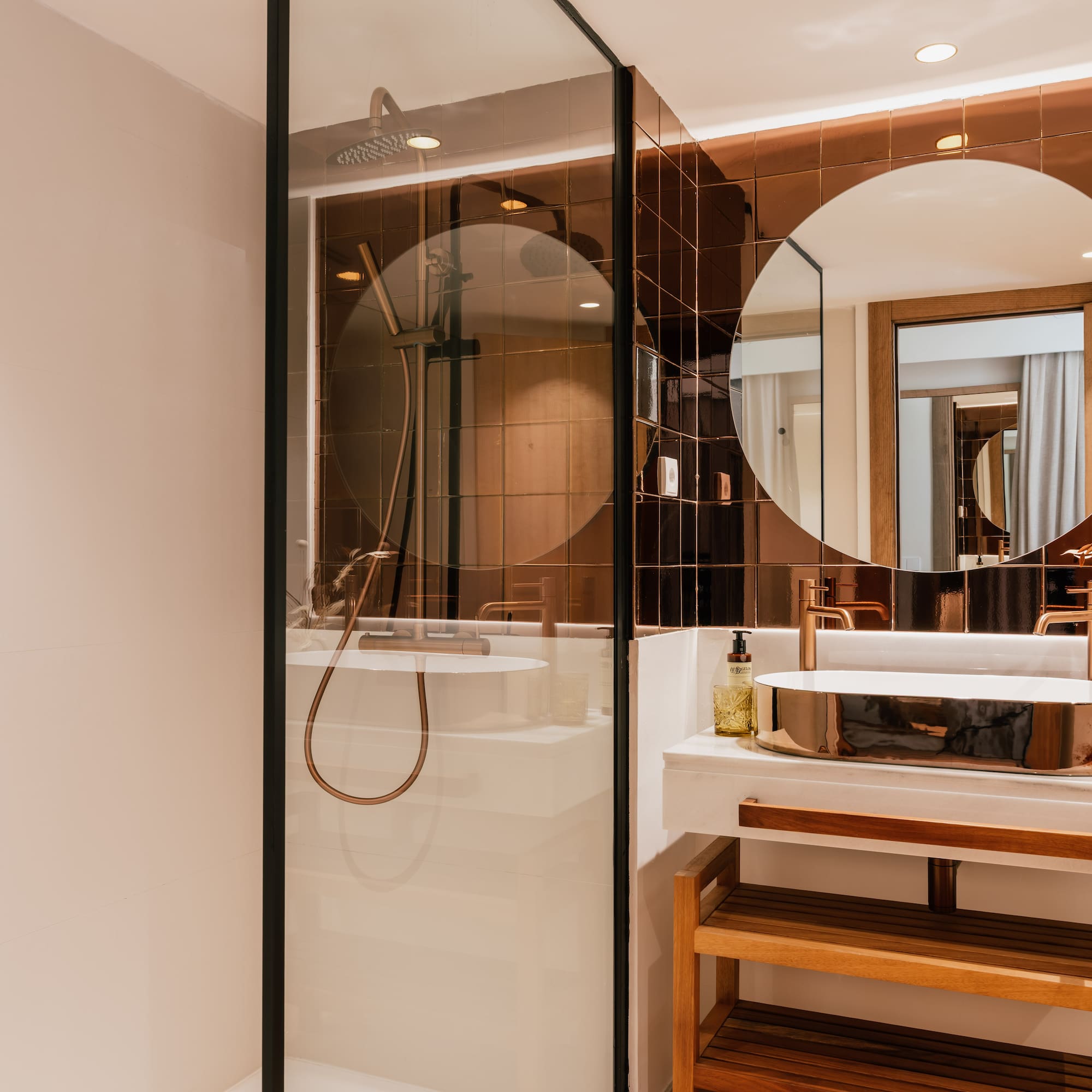 a bathroom with a shower and sink